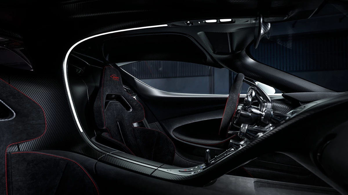 The captivating interior gets a host of new carbon fiber bits, and a Performance Seat to hug you tight through fast corners