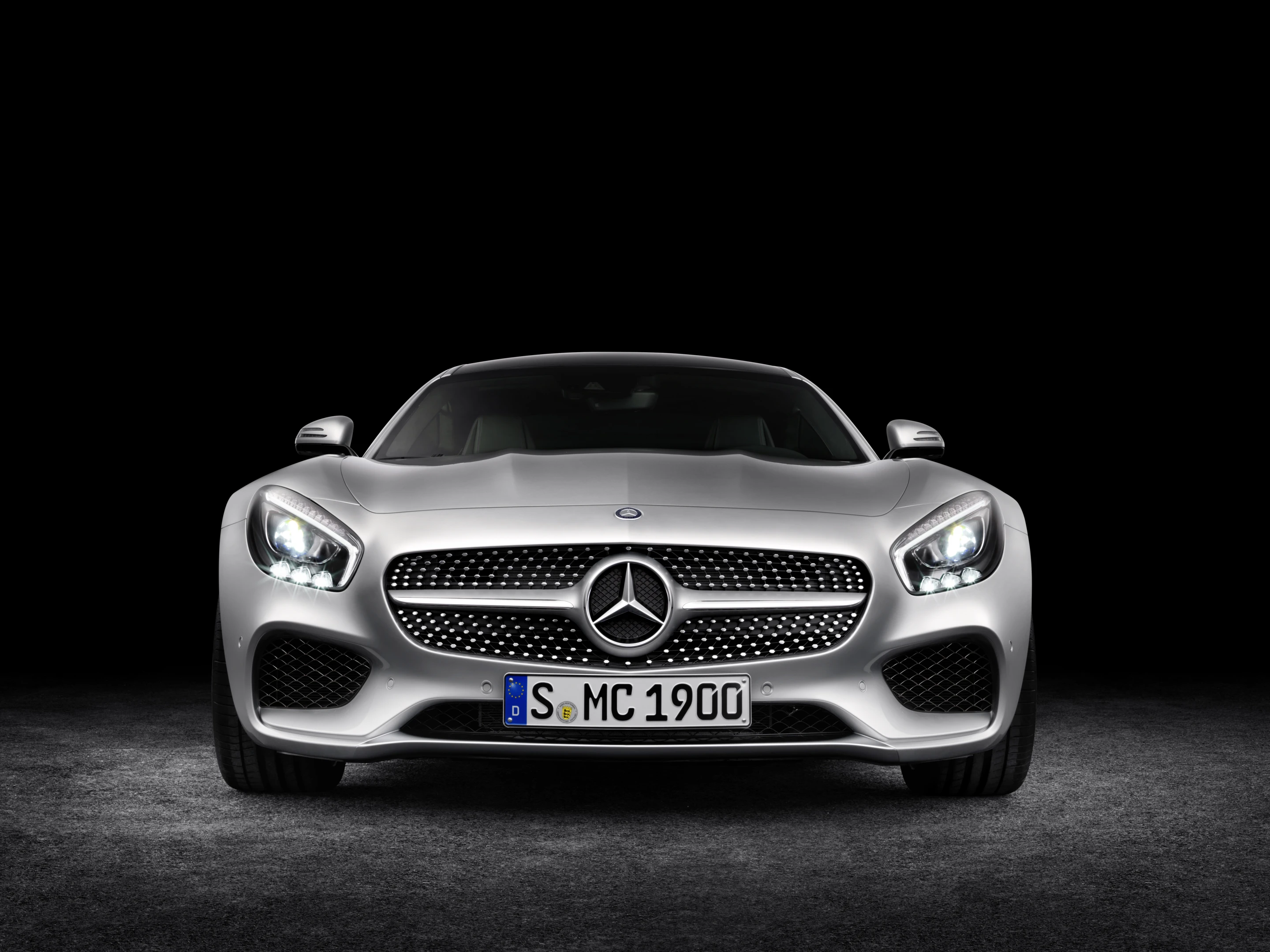 Up front, the car's wide air intakes grant it a great presence on the road