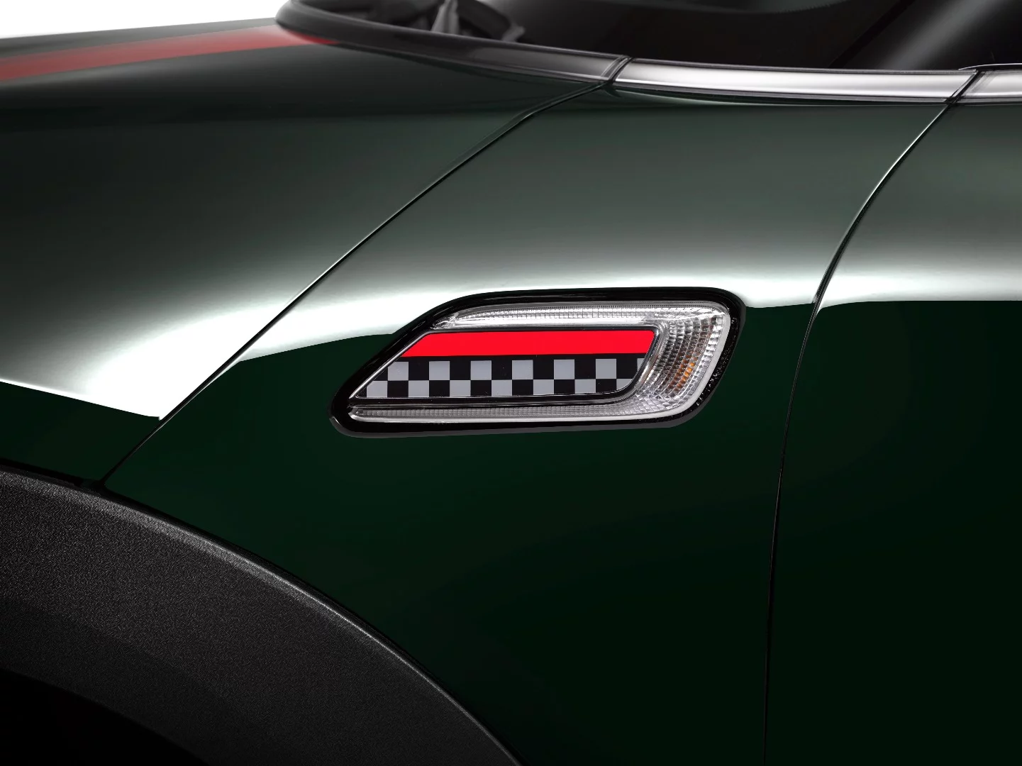 There are two detail options for the exterior's fender badges, including this exclusive racing flag under a chili pepper line