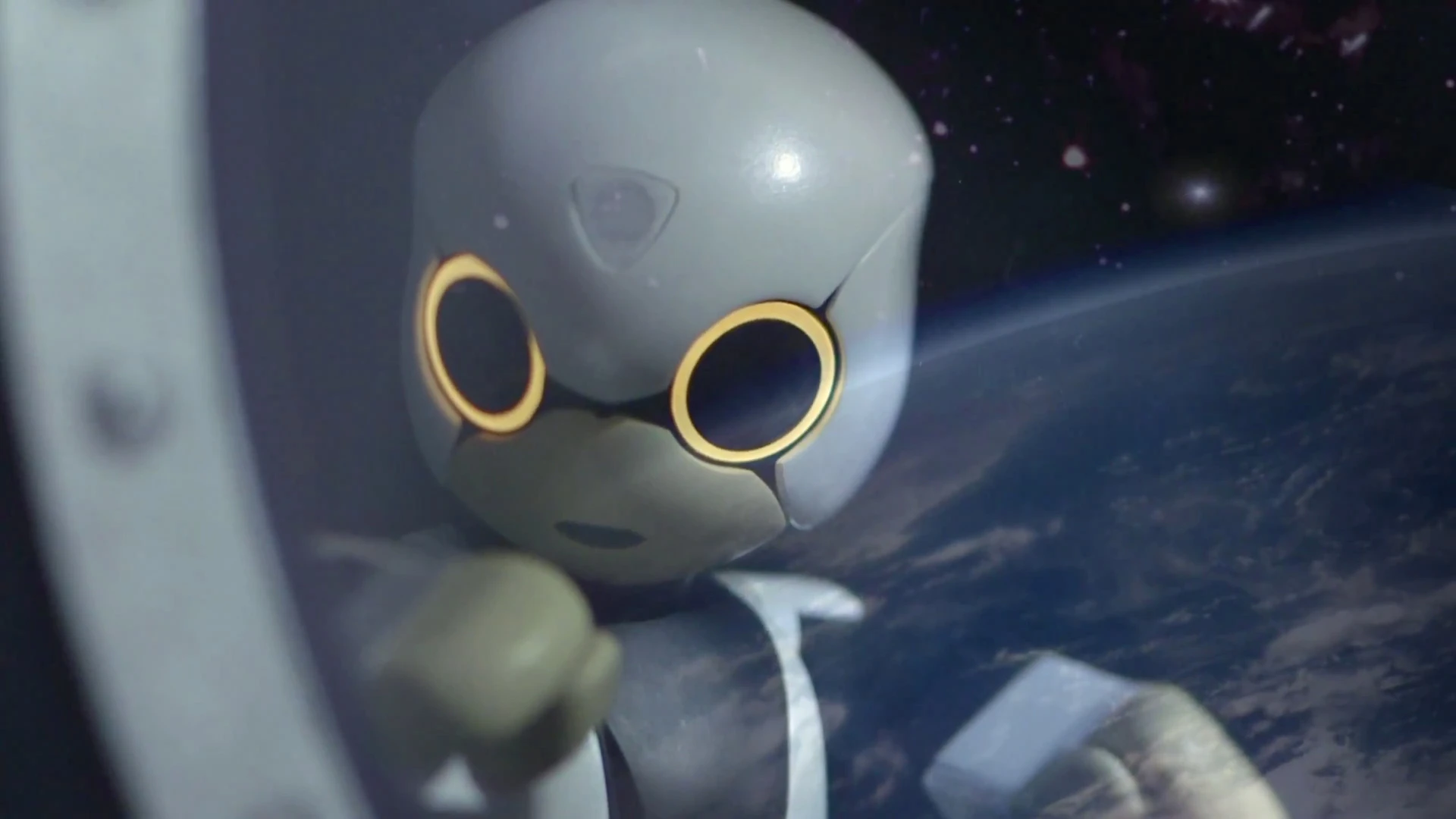 Kibo looks at the Earth from aboard the International Space Station in this promotional image