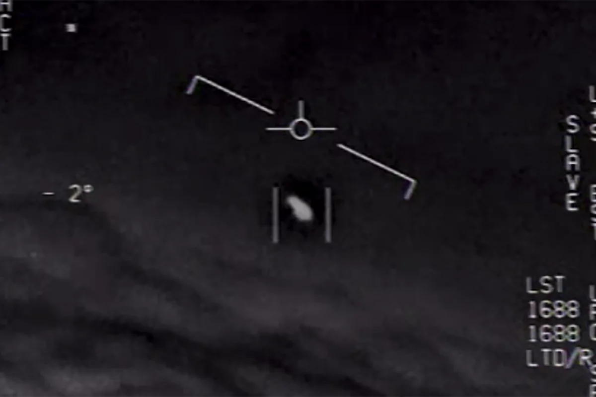 A still of an unidentified aerial phenomenon (UAP) from a video recorded by US Navy fighter jets in 2015