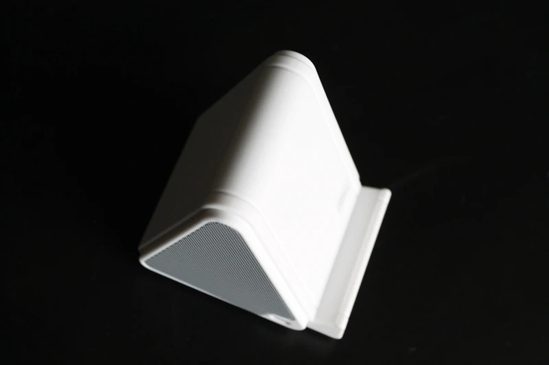 A phone can be rested back on the angled front