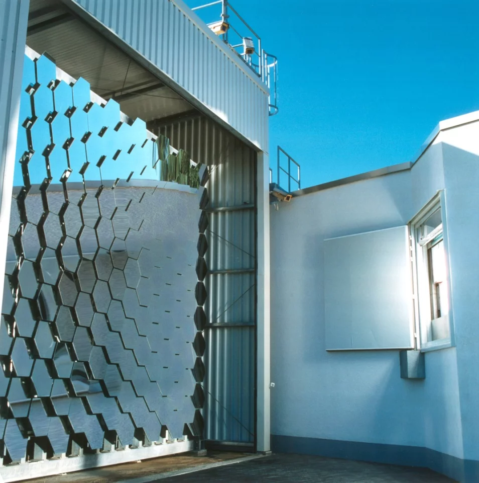 The solar furnace in a German Aerospace Center in Cologne uses 147 curved mirrors to focus sunlight into the high-temperature beam