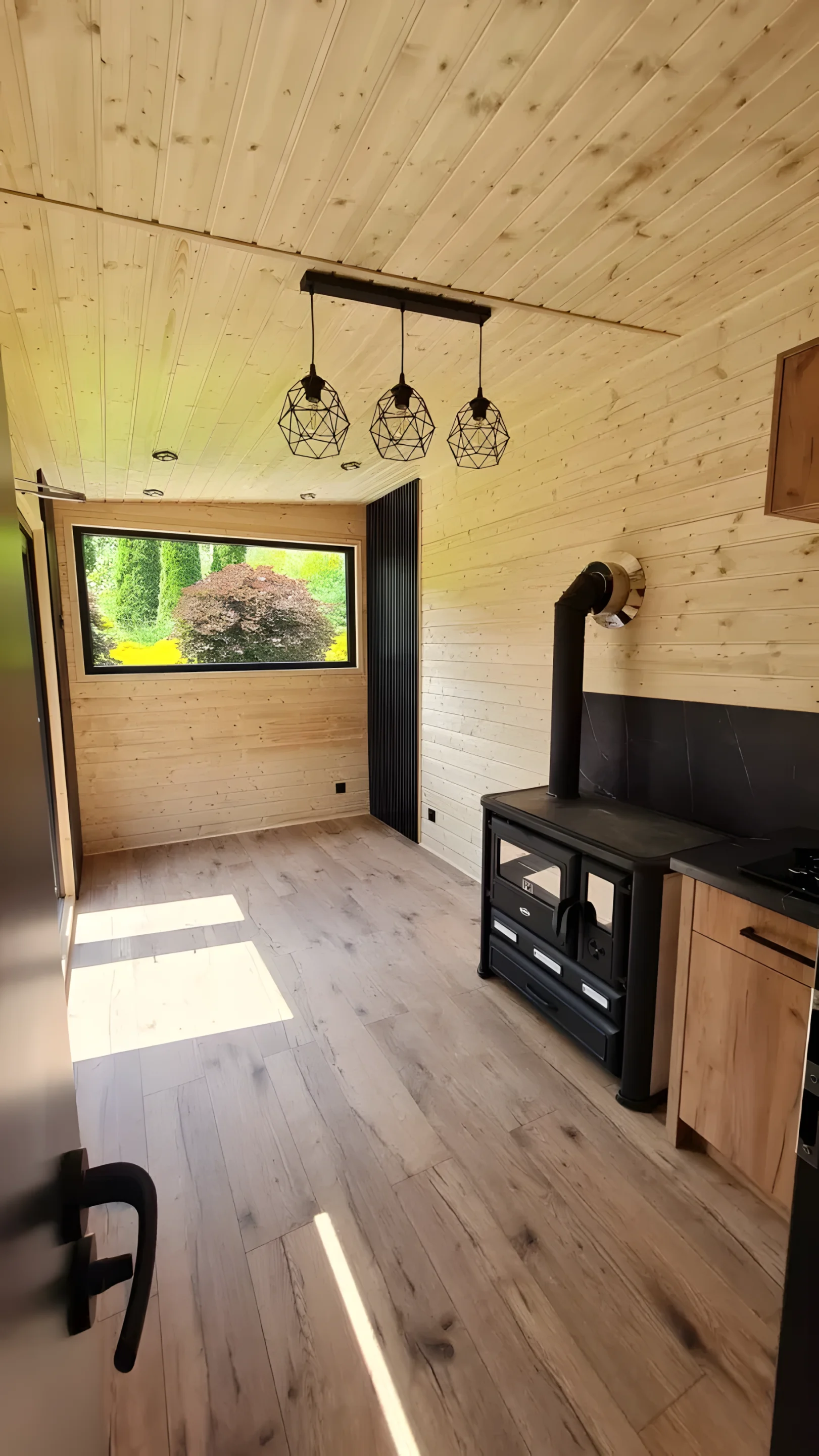 Off grid tiny house with no loft and solar power maximizes space in a ...