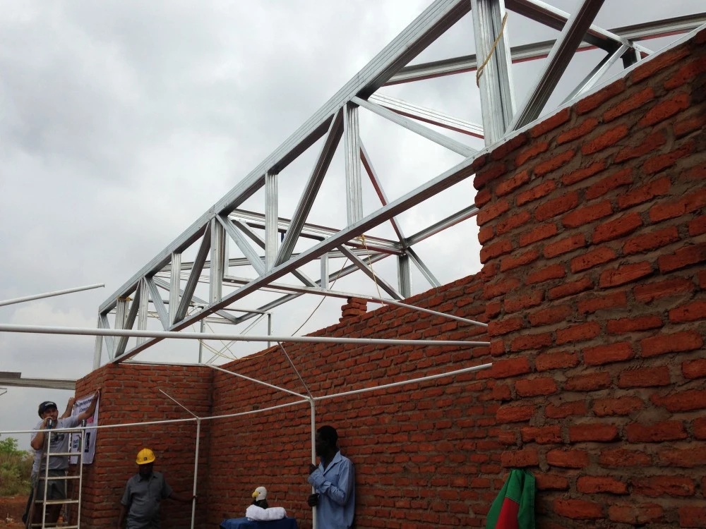 The firm also removed sections of the containers in favor of louver walls made from local masonry to encourage natural ventilation (Photo: Architecture for a change)