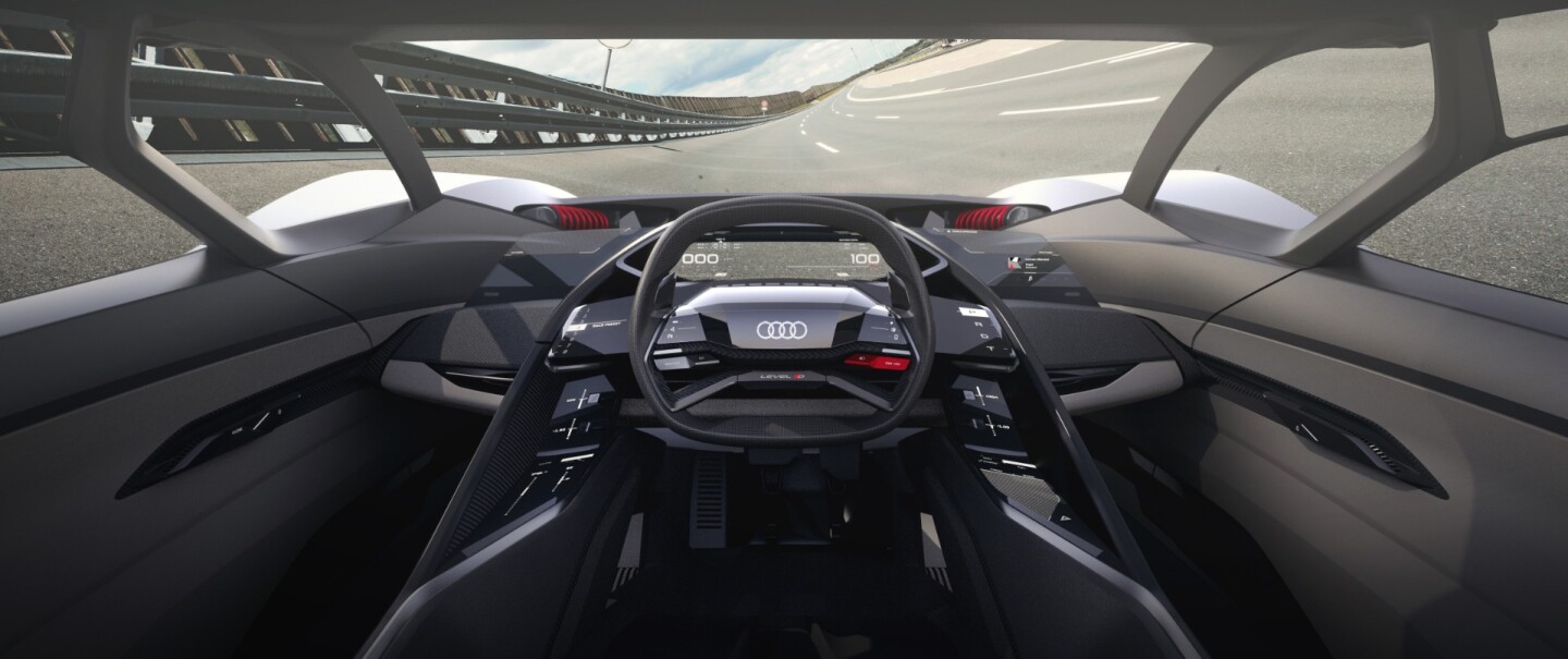 The Audi PB 18 e-tron's interior is designed to be modular, with "track mode" aimed towards maximizing sport driving experience with a center driver's position
