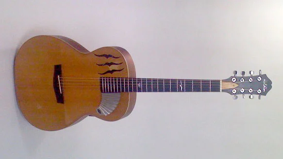 Sure to be a talking point - the Pik'N Board mini-washboard is positioned below the picking area of an acoustic guitar, players extend the pick stroke to tap or scrape a snare-drum-like back beat