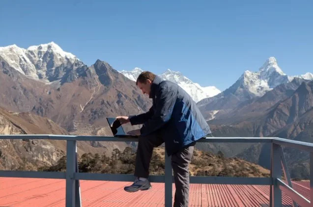 Updating Facebook from high in the mountain range