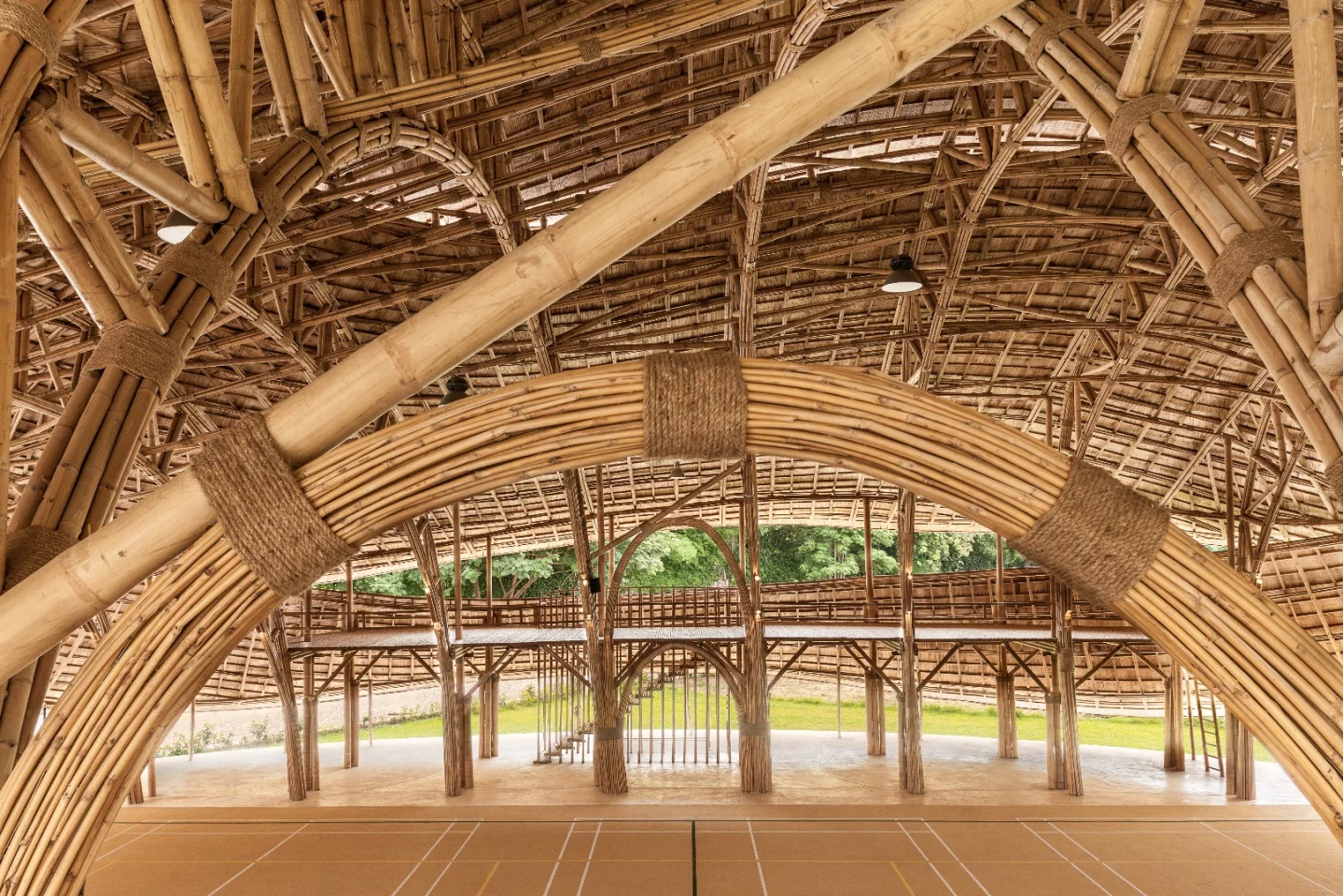 The Bamboo Sports Hall for Panyaden International School aims to combat the hot and wet climate with open, natural ventilation