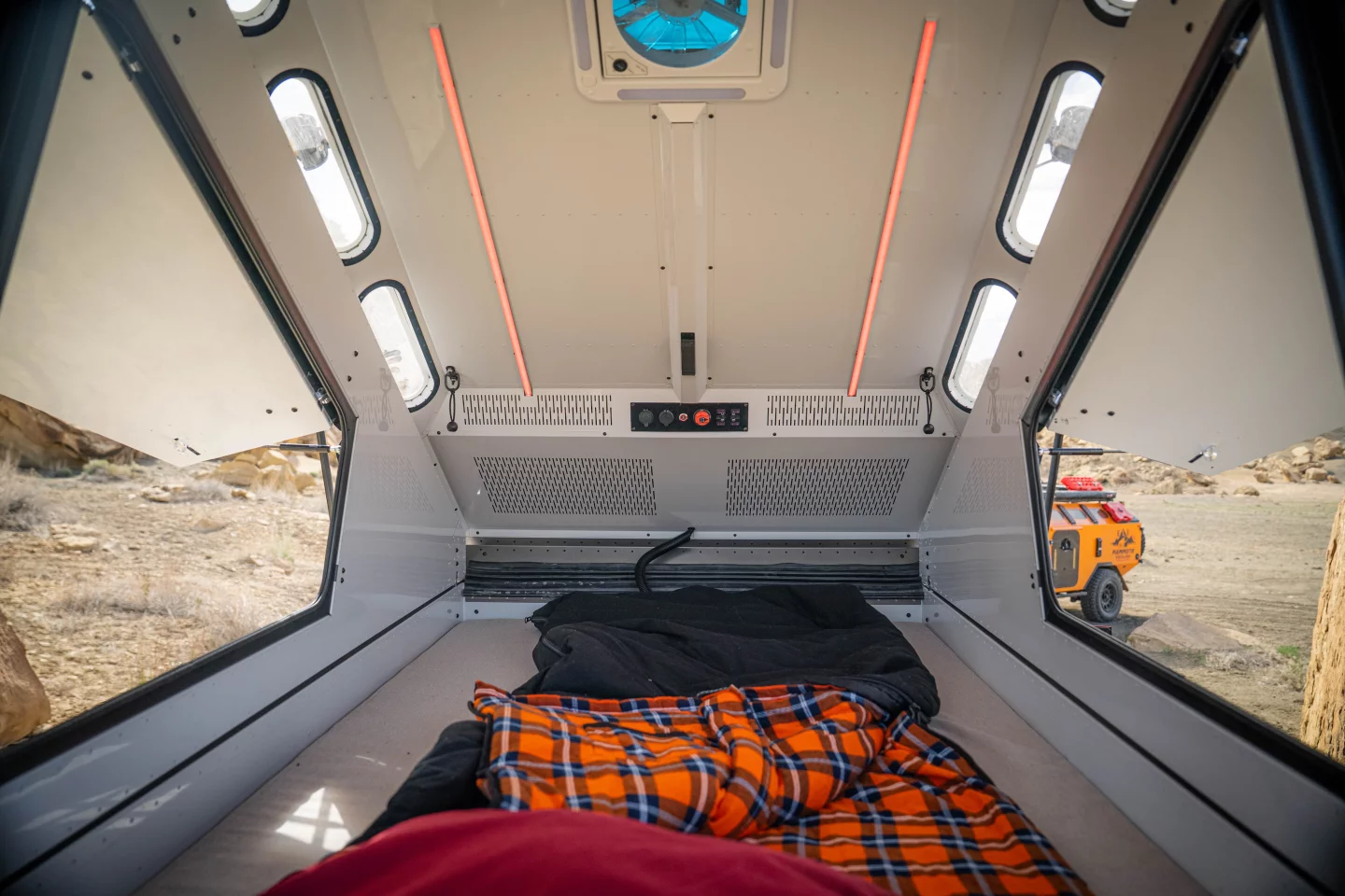 The SKL interior includes enough space for a near-queen-size bed and boasts an electrical system with LED lighting and three-speed fan