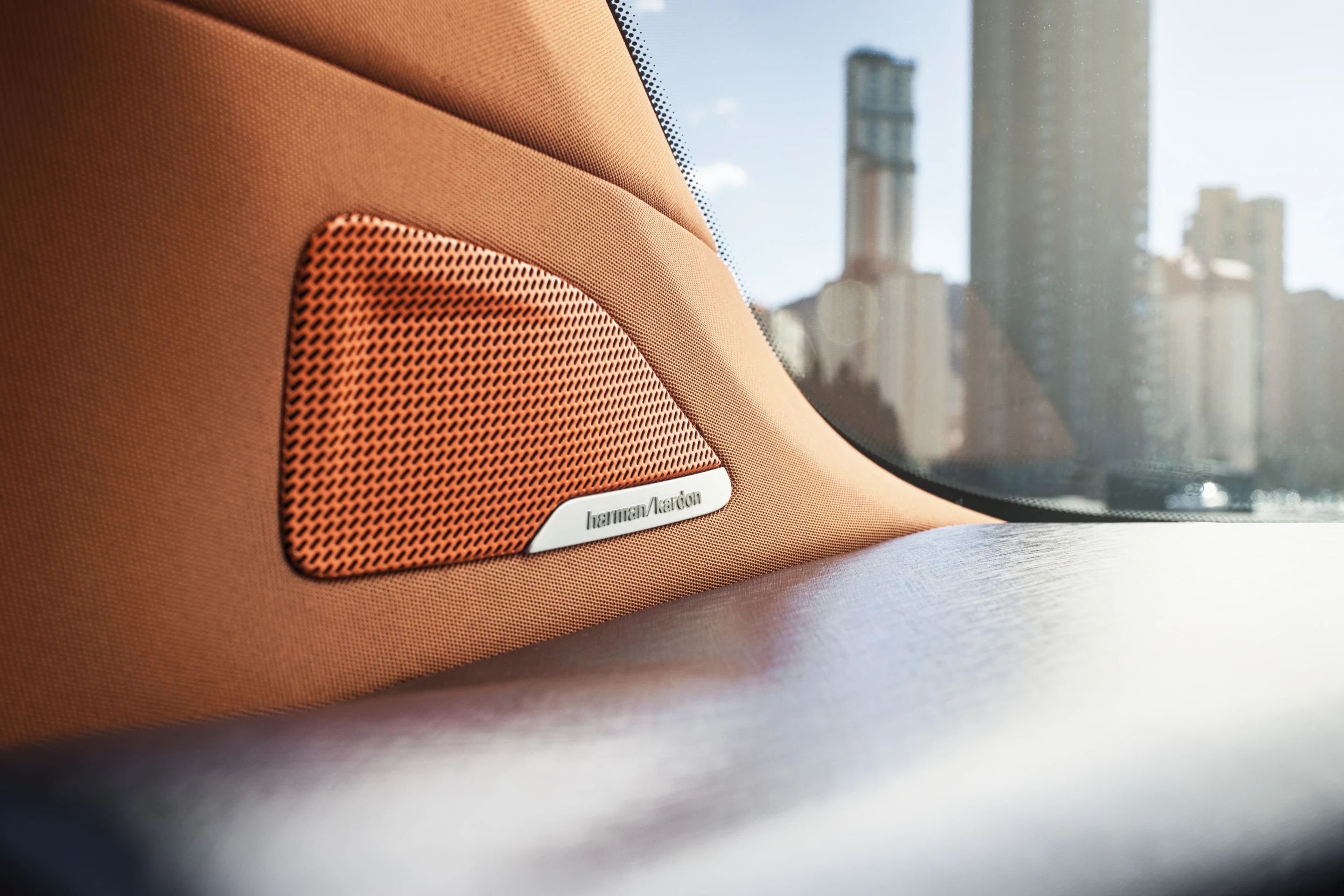 The vehicle incorporates a high-end Harman-Kardon premium audio and video set up