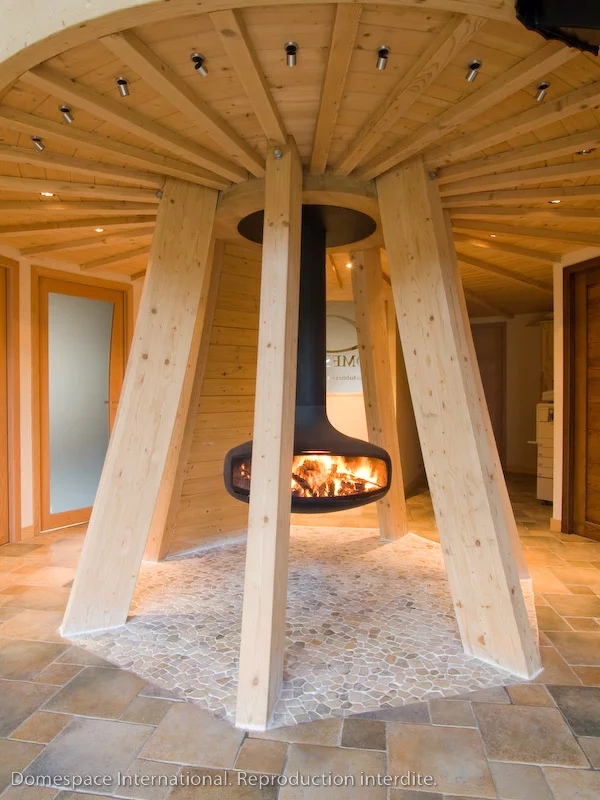 The Focus fire is central to the interior design of the Domespace home