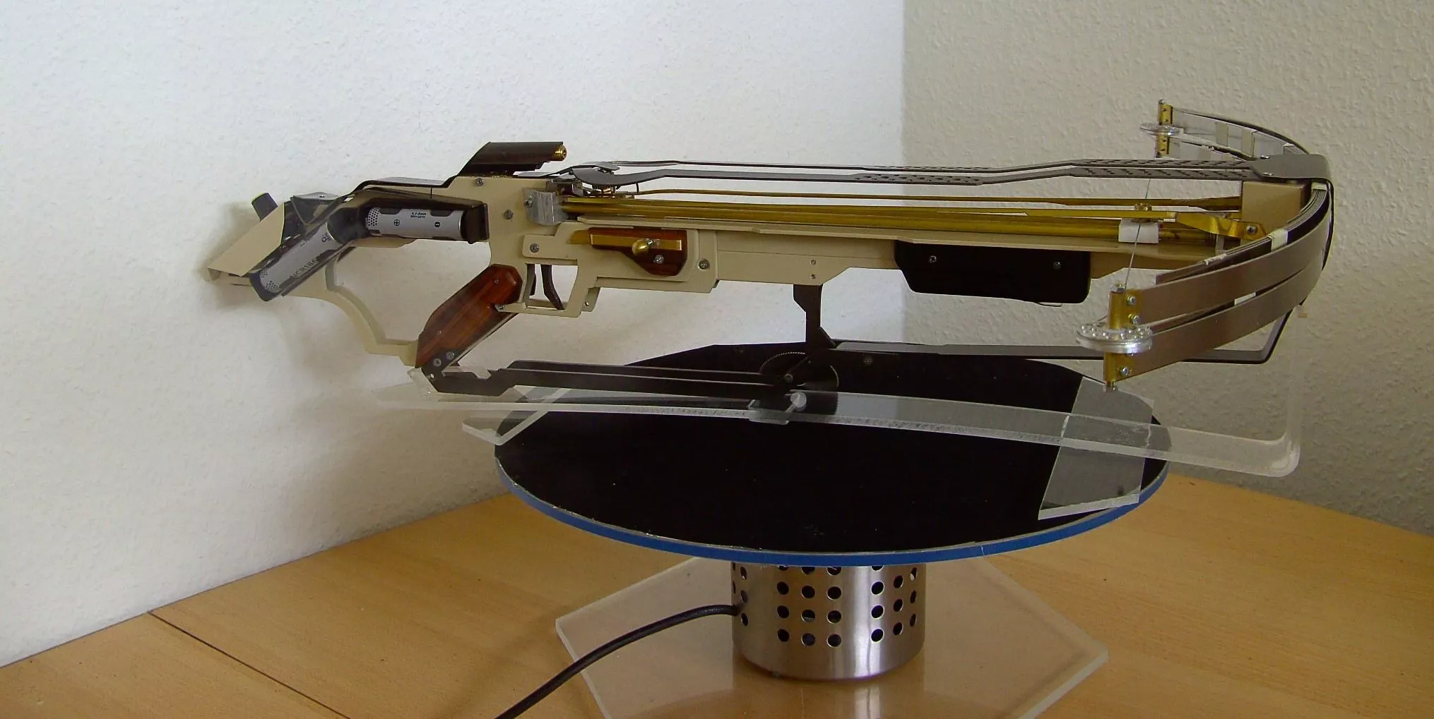 The Blade Drive is a laser-sighted crossbow, that shoots spinning rotary saw blades