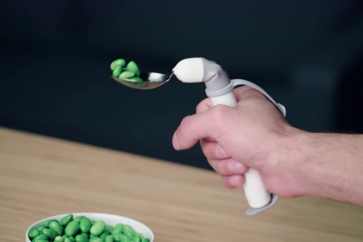 The Liftware Level is a motorized utensil that automatically bends itself to counteract involuntary hand movements, to allow people afflicted with disorders like Parkinson's and Huntington's disease to feed themselves