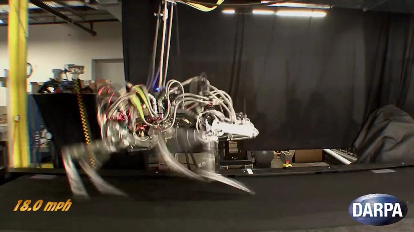DARPA's quadruped CHEETAH robot has broken the land speed record for legged robots by reaching a gallop of 18 mph on a treadmill