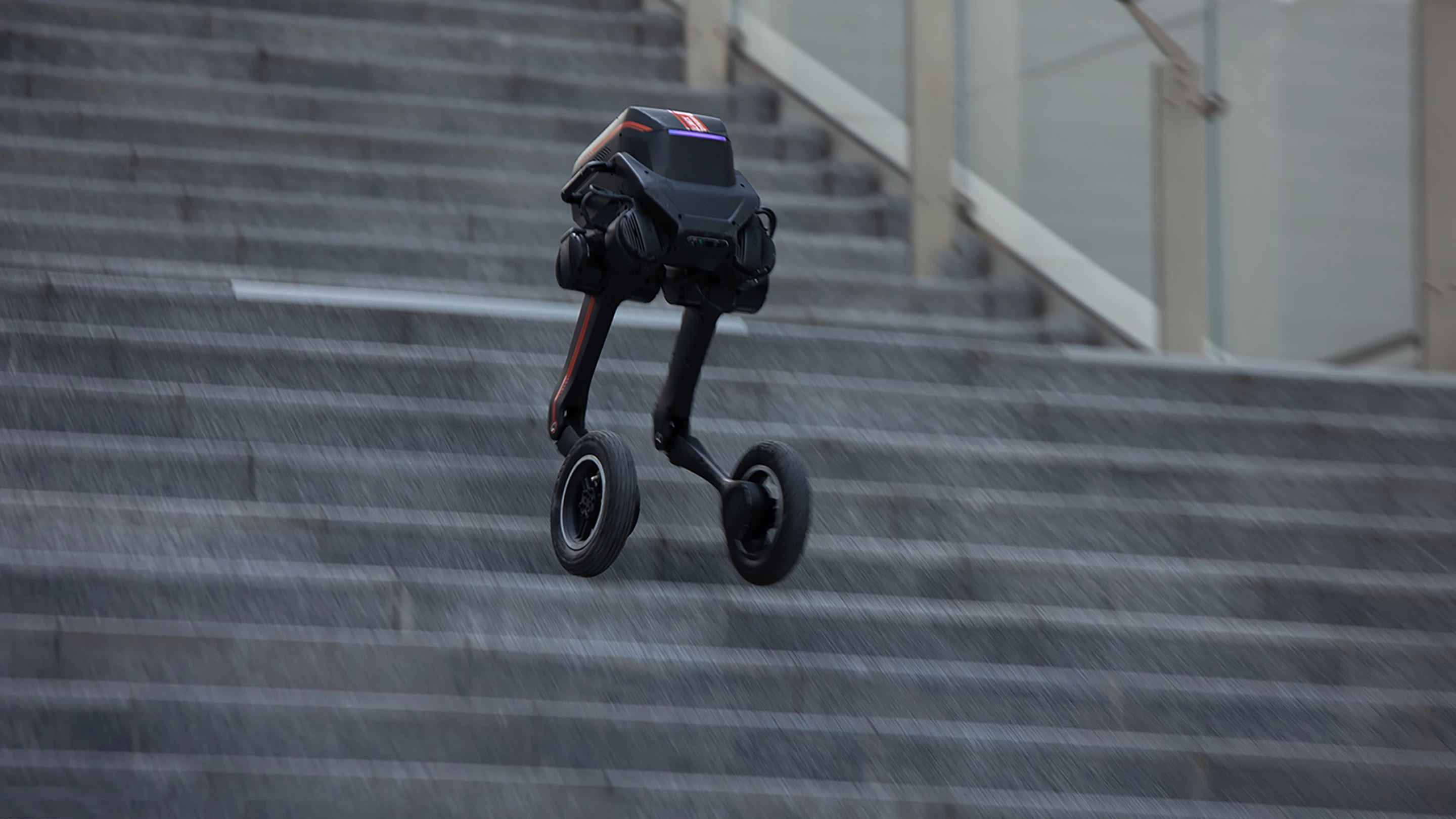 The Tron 1 zipping down regular steps at speed