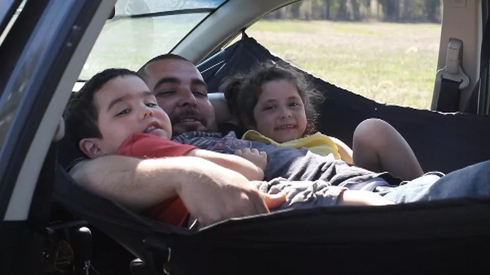 Car Hammock doesn't have an official weight limit, but it says that it's had multiple people up to around 310 lb (140 kg) in the hammock without a problem
