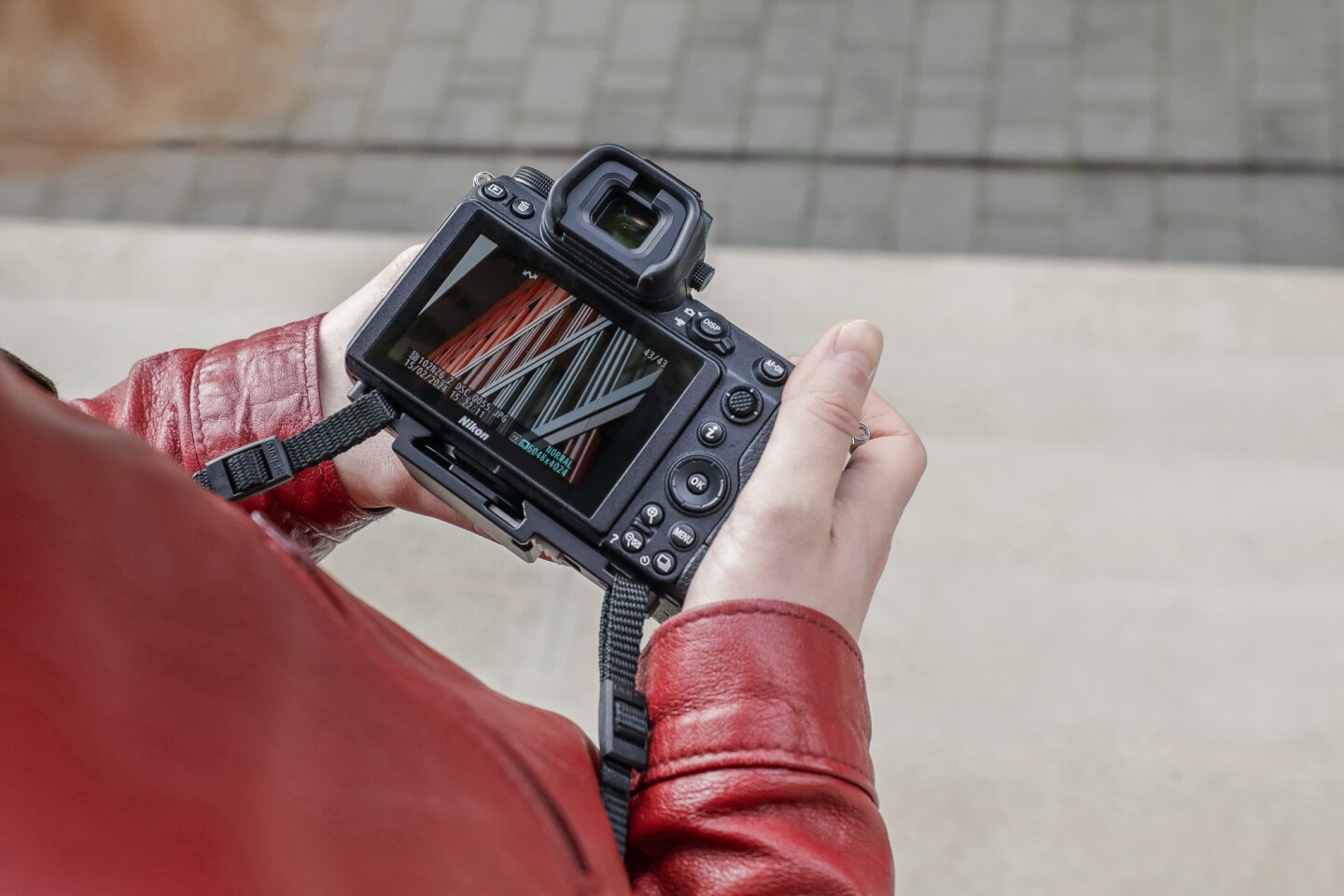 With Swift-Lock, the strap doesn't hang across the camera's screen