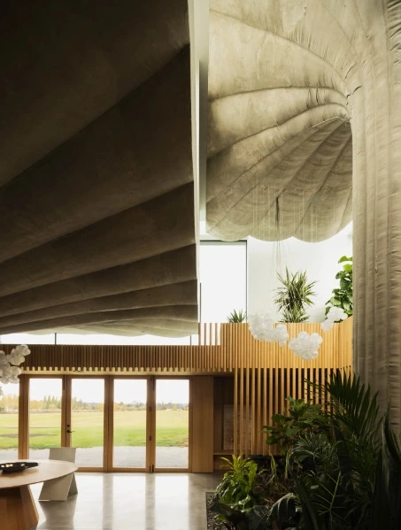 Concrete columns become integral elements within the design of the home