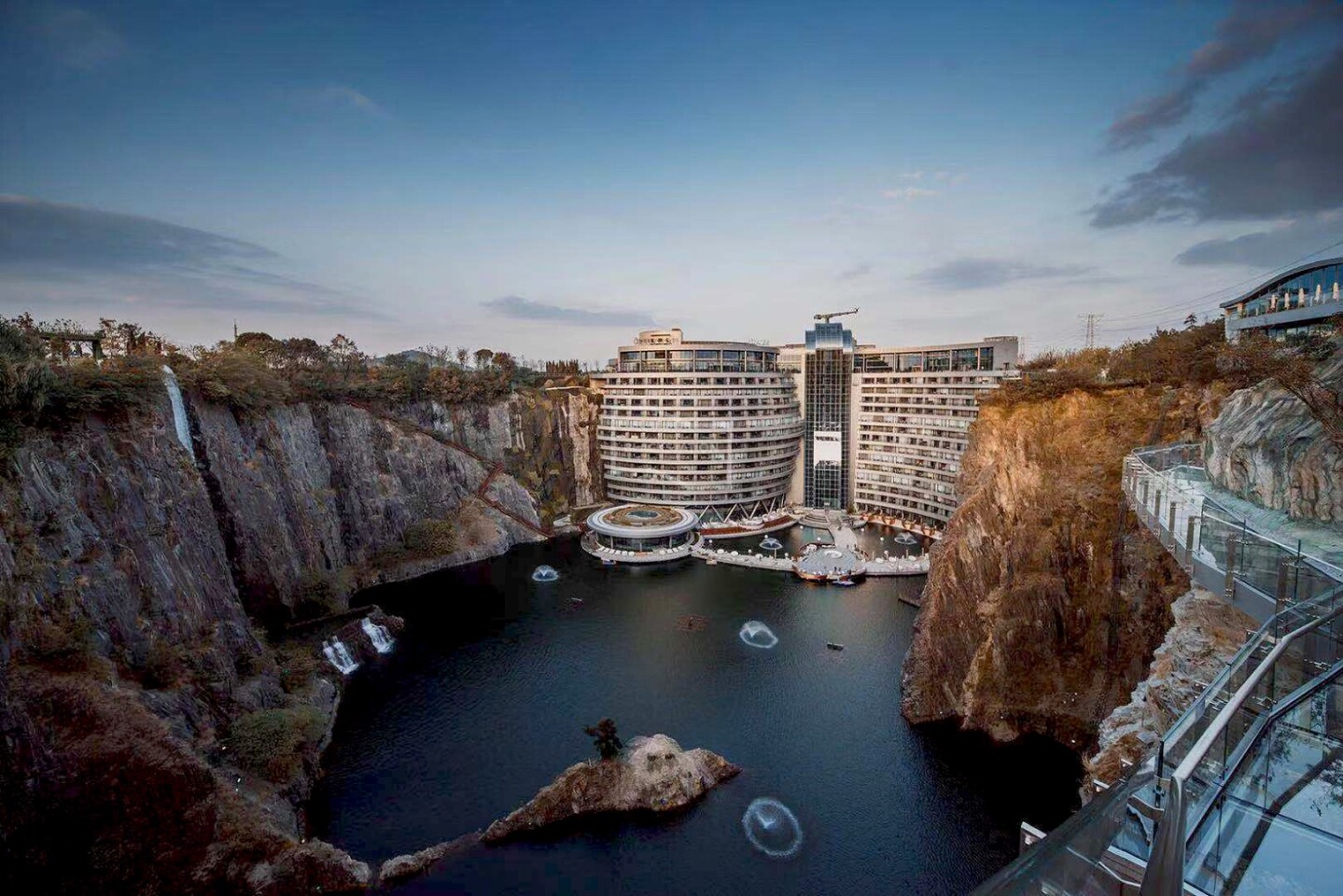 The Shimao Wonderland Intercontinental Hotel features a glass walkway