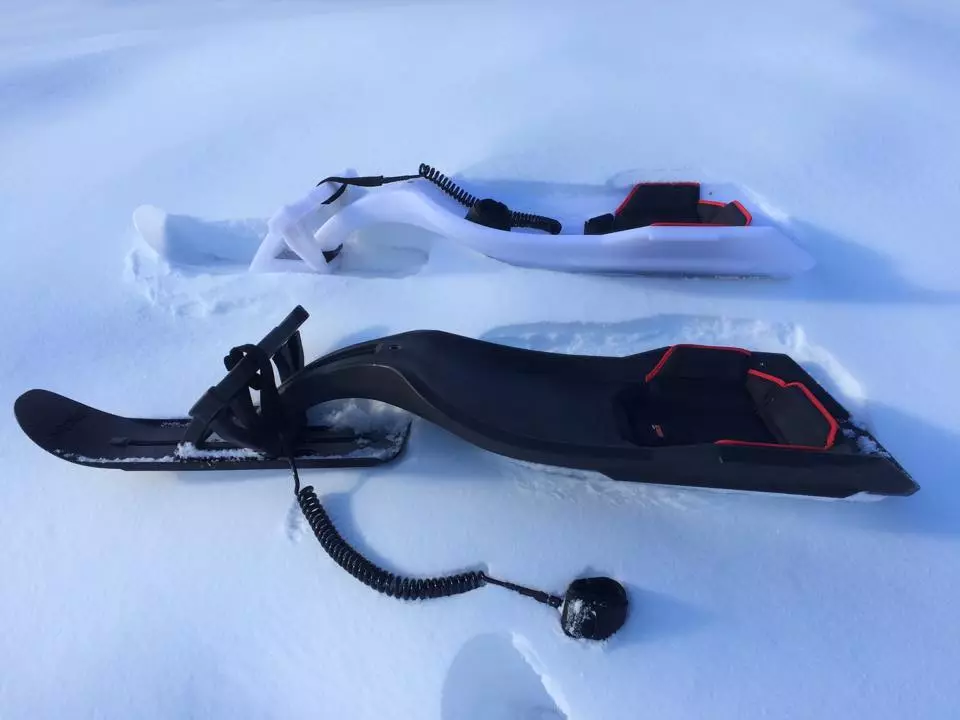 It features a waterproof nylon-covered high-density foam seat, replaceable polished stainless steel/alloy runners, and a shock coil lanyard to keep it from getting away from you