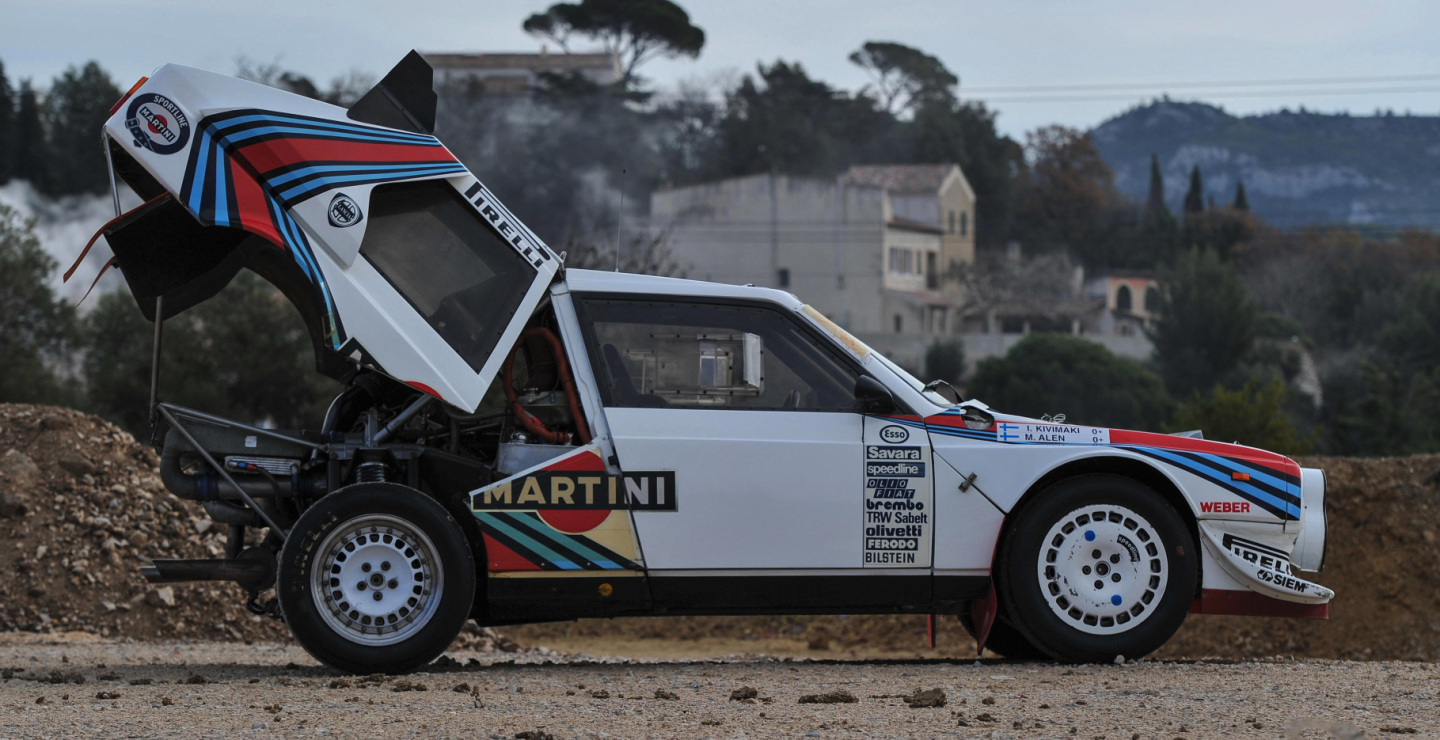 No sale | 1986 Lancia Delta S4 Groupe B Rallye | Estimate: €580,000 to €780,000 | Bonhams | Lot 410 | Auction Description Lancia won the World Rally Championship for Makes 11 times between 1972 and 1992, with the Fulvia HF, Stratos, Rally 037, and the Delta family (S4, HF, and Integrale) among the most successful rally cars of all time. Lancia had introduced the new 4WD Delta S4 WRC contender in 1985, bearing a skin deep resemblance to its front-wheel-drive road-going namesake when in actuality, the two-seater S4 had fully adjustable all-independent suspension, lightweight composite bodywork, all-wheel drive via central and remote differentials and a 400 hp Abarth-designed 1,759cc, 16-valve engine with both super- and turbo-charging to reduce the effects of "turbo lag" at low revs. In use for only 13 months, the Lancia Delta S4 is one of the rarest of Group B rally cars. So rare is the S4 that there is considerable doubt that Lancia actually produced the 200 road cars required for homologation, with expert opinion being that fewer than 80 exist today. Genuine works cars are even rarer. This one didn't sell due to the high expectations of the vendor, but ... what a car!