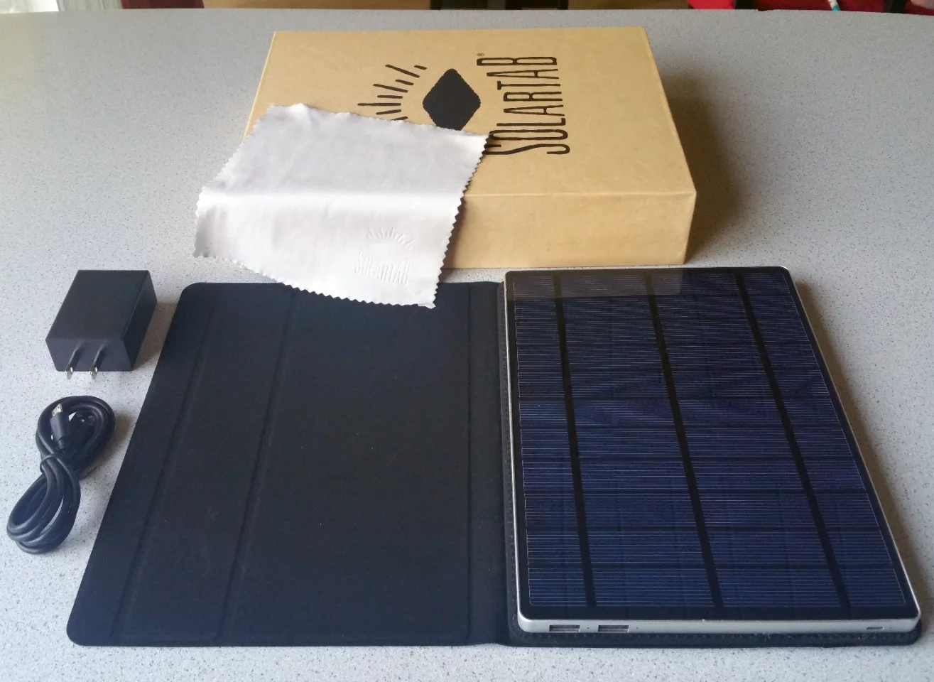 Along with the Solartab comes a wall adapter, USB charging cable, and microfiber cleaning coth
