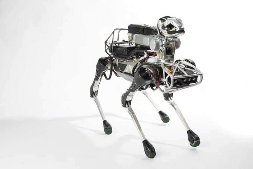 The previous SpotMini with manipulator arm