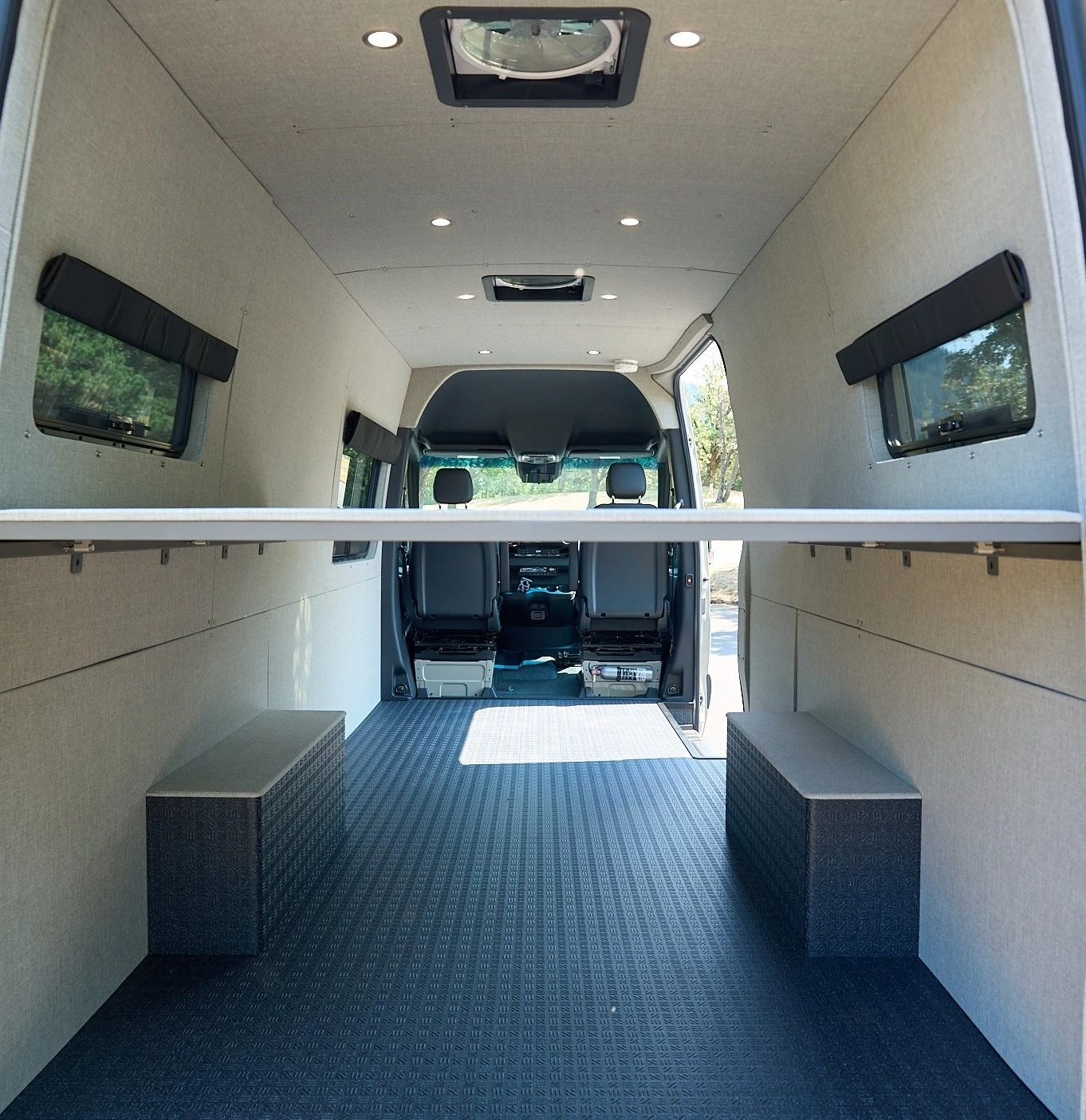 A cargo-ready adventure sleeper van off the lot and a blank canvas with which to work on a more complete camper van