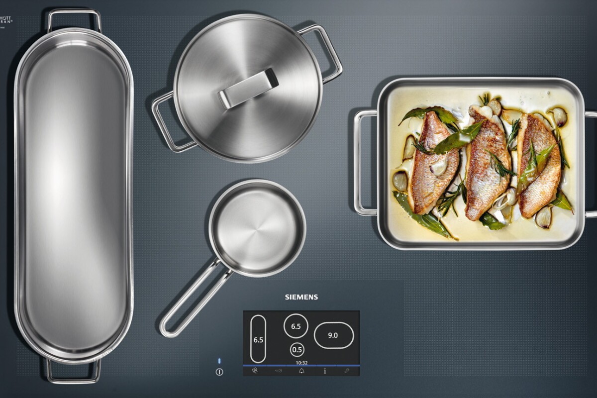 Siemens' full-surface induction cooktop allows up to four pieces of cookware to be placed anywhere on its surface