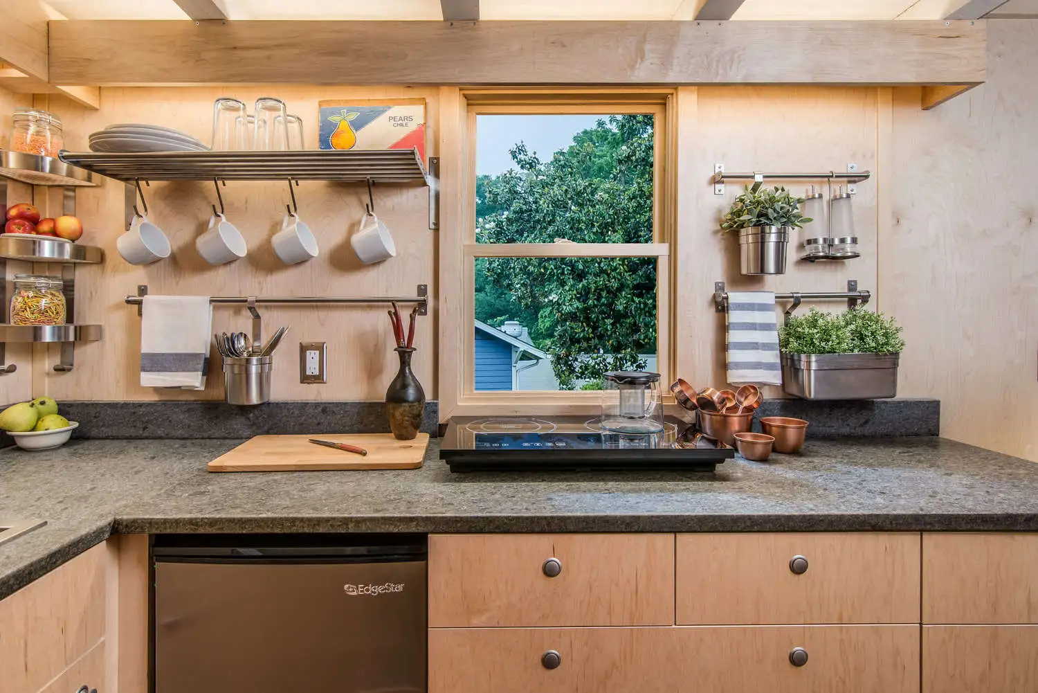 The kitchen boasts plenty of storage space
