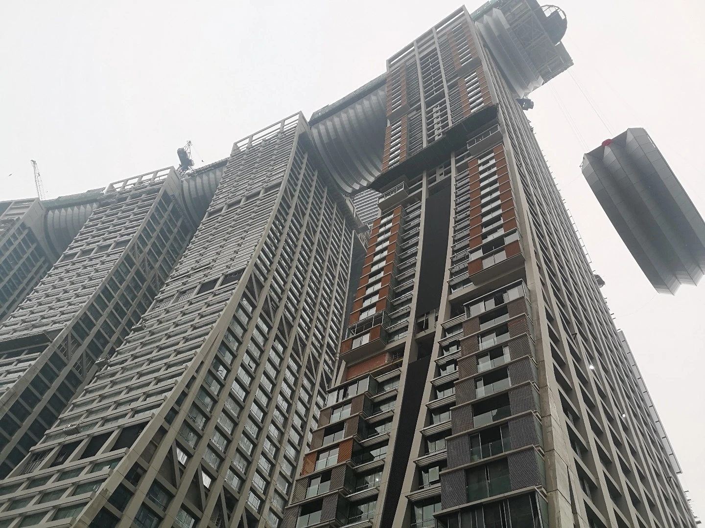 The Raffles City Chongqing's skybridge being hoisted into position