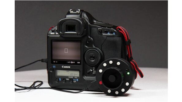 The Okii Systems USB Follow Focus works with many Canon EOS DSLRs (shown here with the EOS 1D Mk IV)