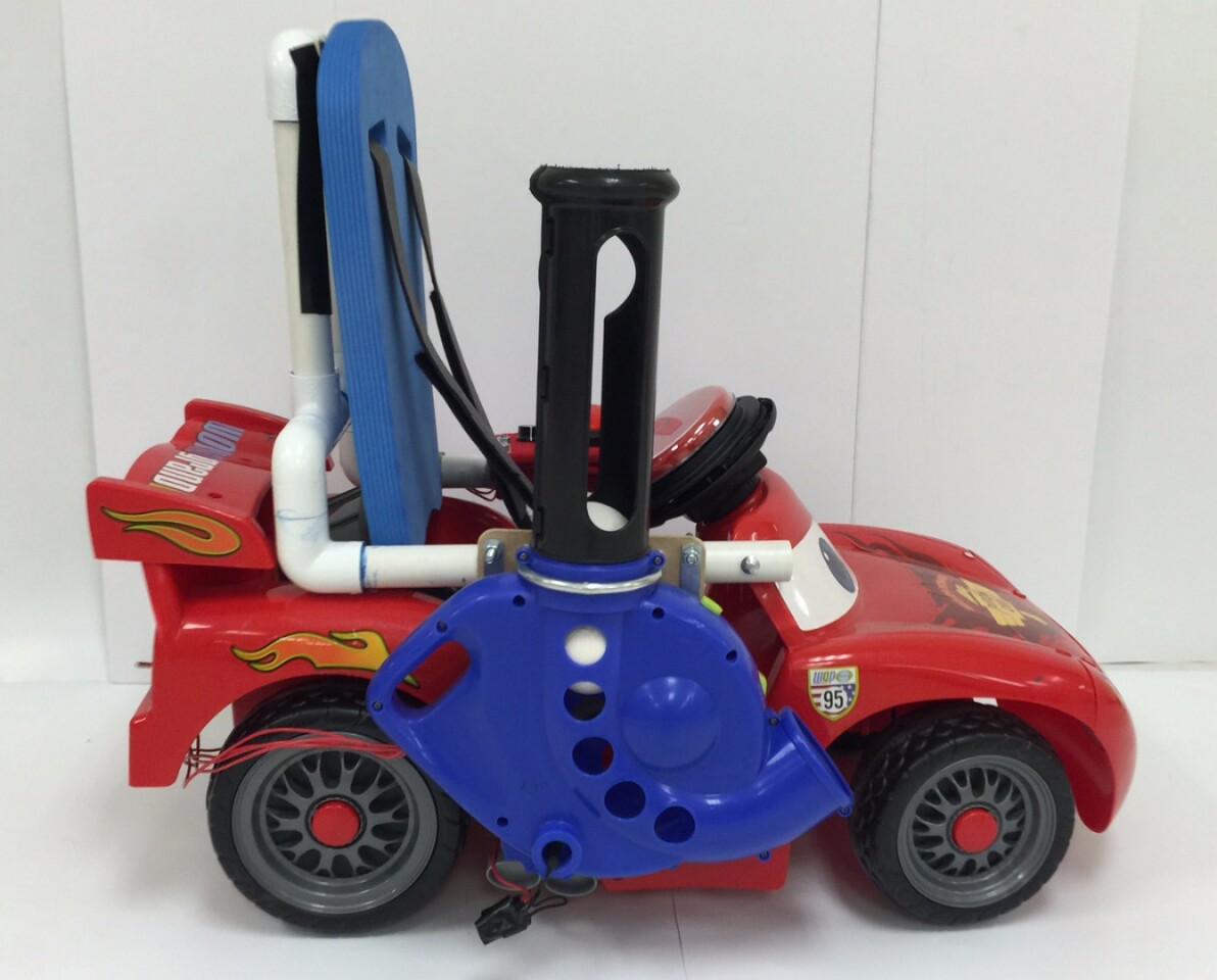 A soft ball pitcher has been added to the Throw Baby Throw car to allow disabled drivers to join in with throwing games