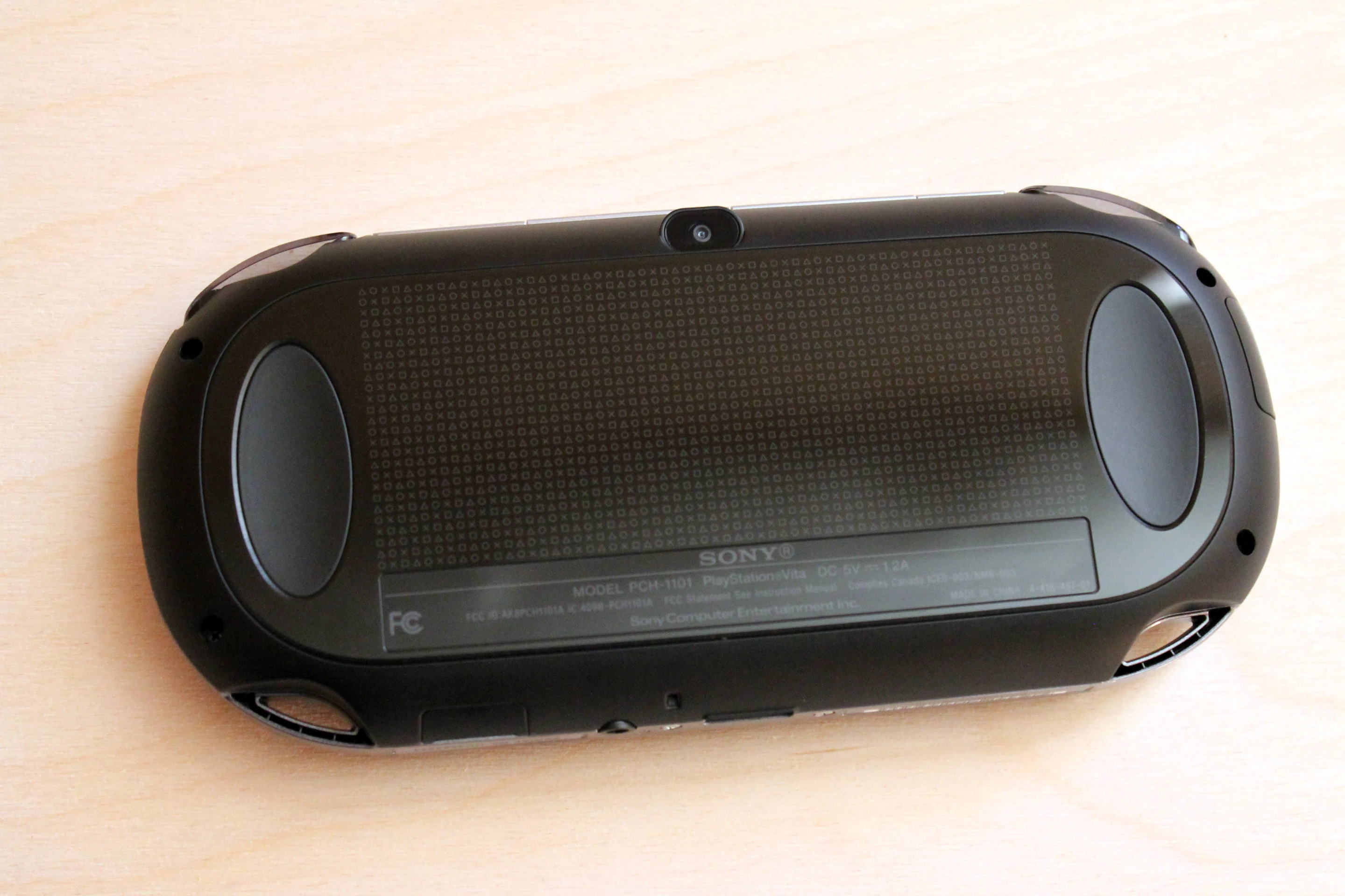The Vita has a touchpad on its back