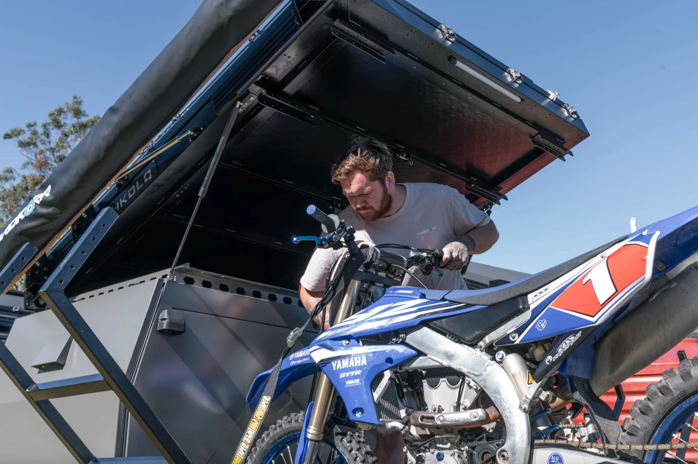 The strut-lifted tent topper provides more headroom for getting gear situated and secured