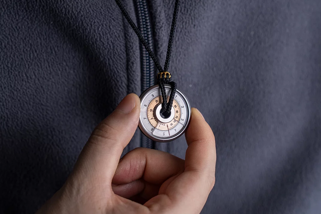 A lanyard can be run through the hole in the middle