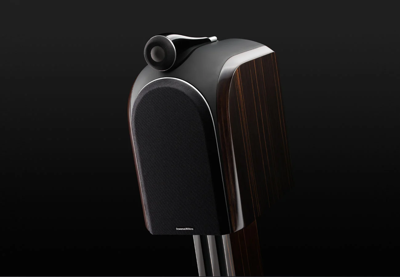 The front baffle and curved top panel are made from a mineral-resin-filled thermoset composite material for additional mass and damping