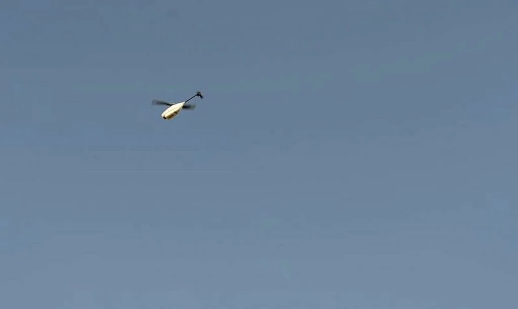 On a full charge, the tiny UAV can fly up to 30 minutes at a top speed of 22mph (35kph) [Image: © Crown copyright]