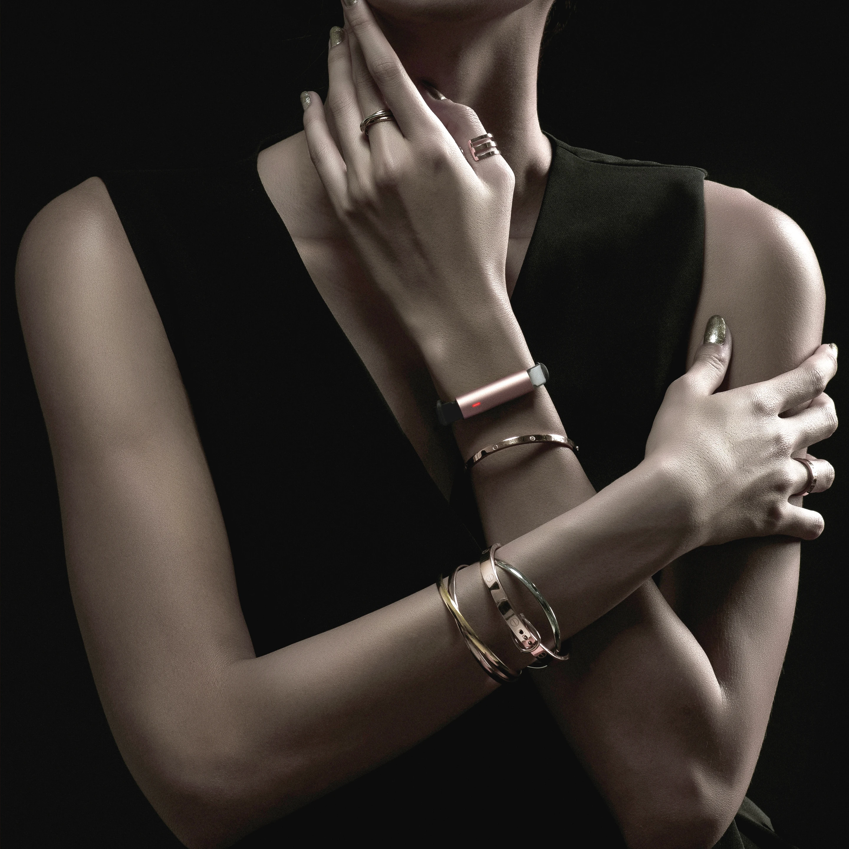 The Misfit Ray can rest on wrists or sway from necks, via hidden spring bars