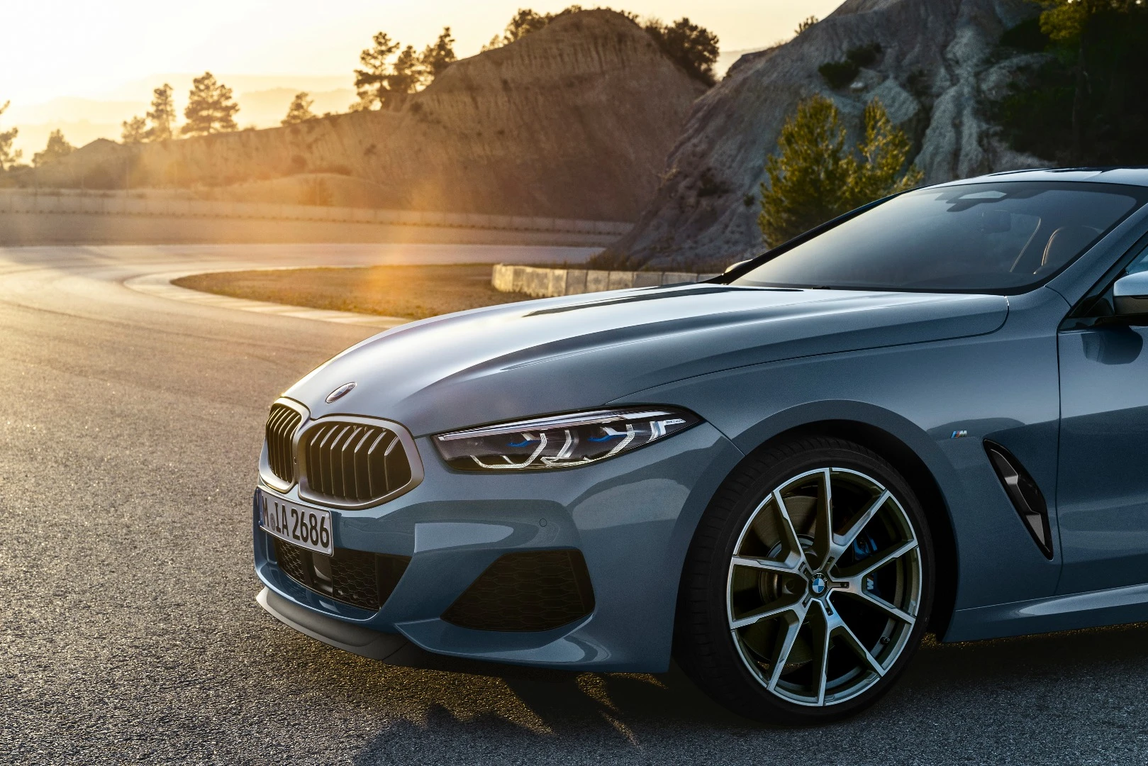 The hood lines of the 8 Series Coupe are clearly drawn from the concept, though the headlamps are a bit widened to soften that