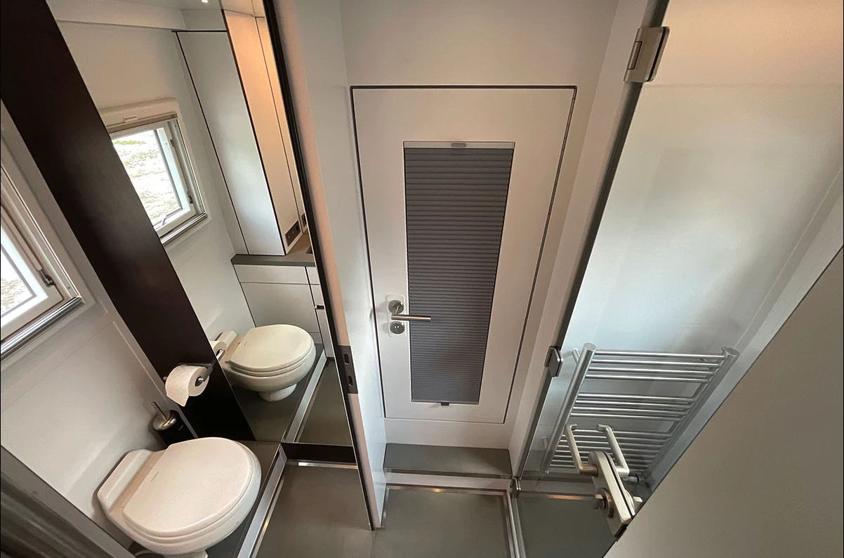2022 Action Mobil Global XRS 7400 bathroom with door to driver's cab