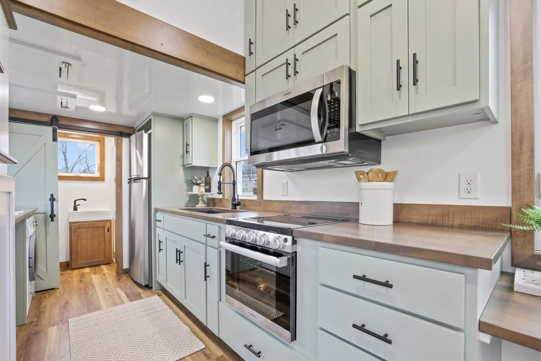 The Bofin's kitchen includes generous storage space, including overhead cabinets