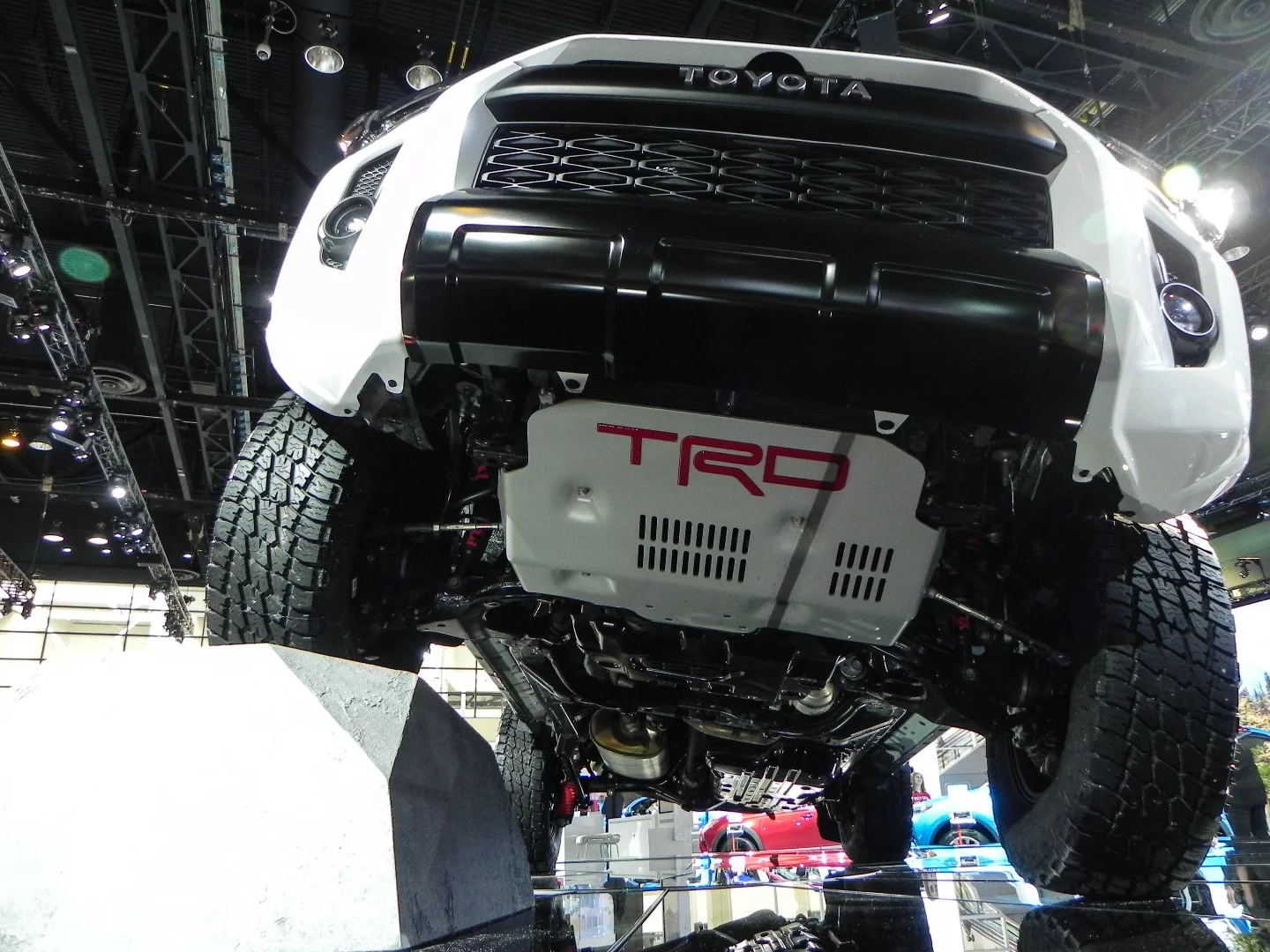Underneath the Toyota 4Runner TRD Pro, the heavy-duty skid plate dominates and nearly hides the unique KDSS sway bar disconnect system