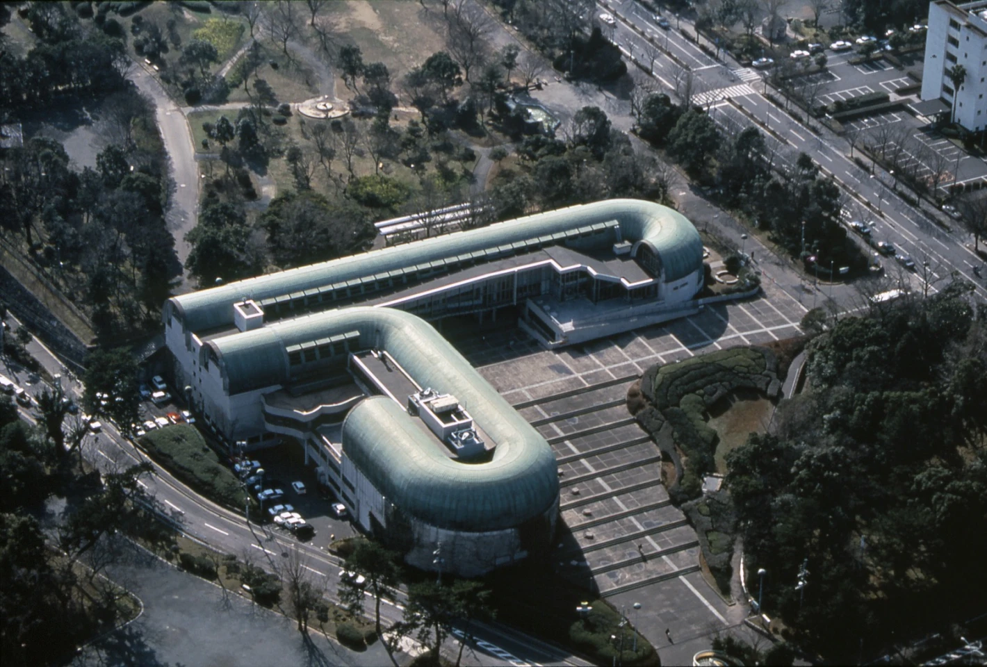 Kitakyushu Central Library, located in Japan, opened in 1974, and shows Mitsumasa's avant-garde influences