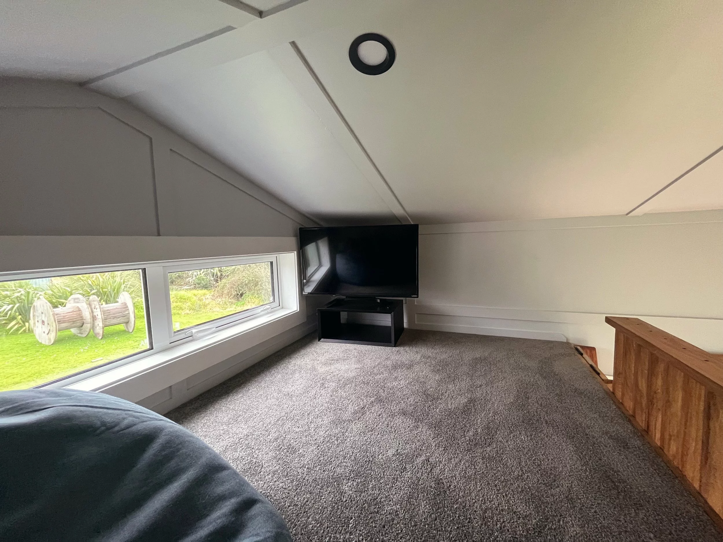 The Maple's secondary bedroom is currently being used as a hangout area