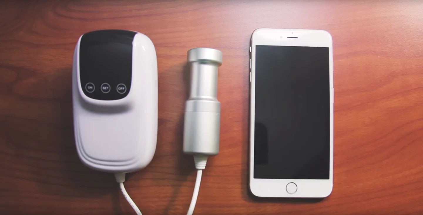 The Sonic Soak is small and portable, and the kit includes the submersible cylinder that emits ultrasound waves and the wall unit that lets users control it and set timers