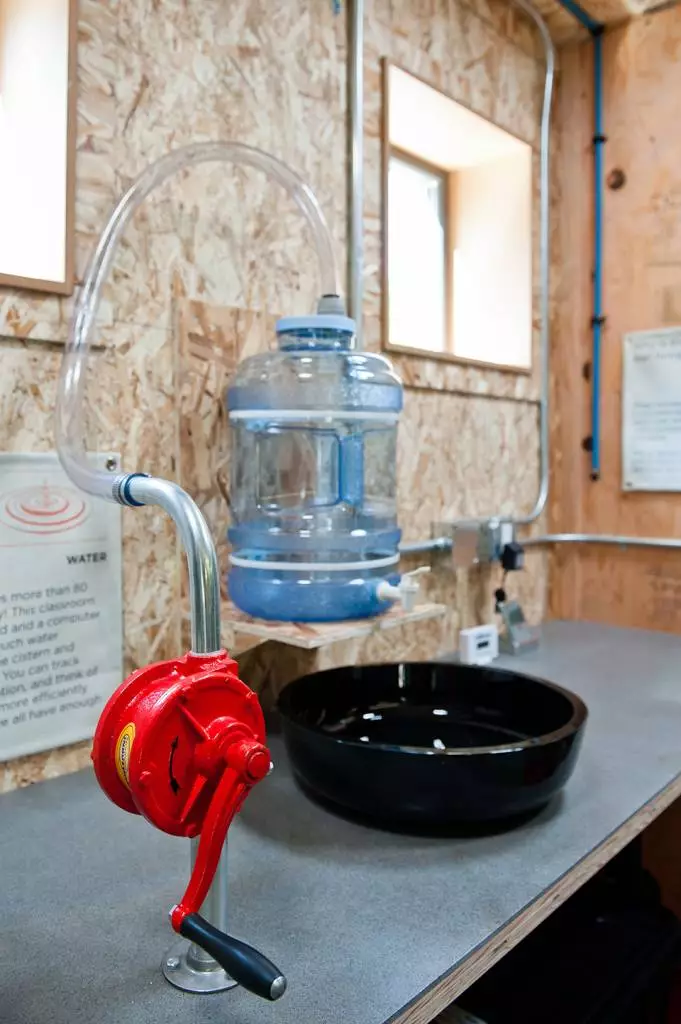 The SEEDclassroom's composting toilet helps to minimize water use, as does the sink in the classroom's Living Laboratory. Its water comes from a water cooler-type transparent bottle, which is refilled by hand pump when empty