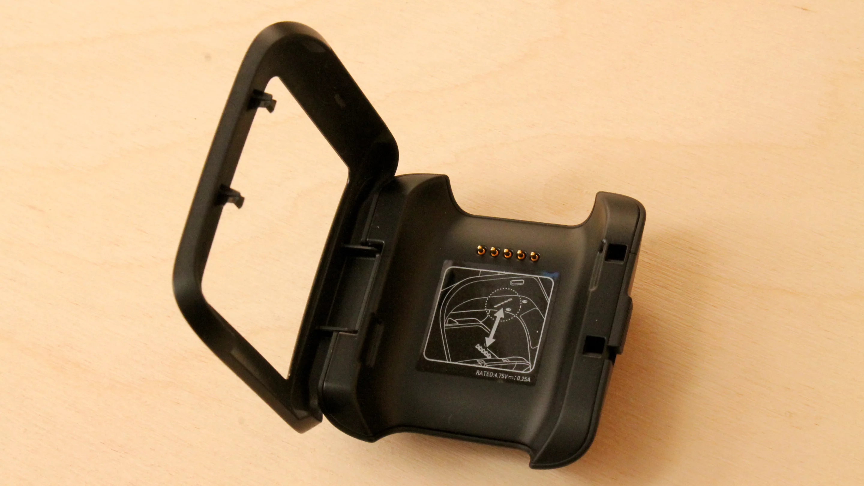 The charging cradle is an odd choice, but at least it prevents the watch itself from having an unsightly charging port on it