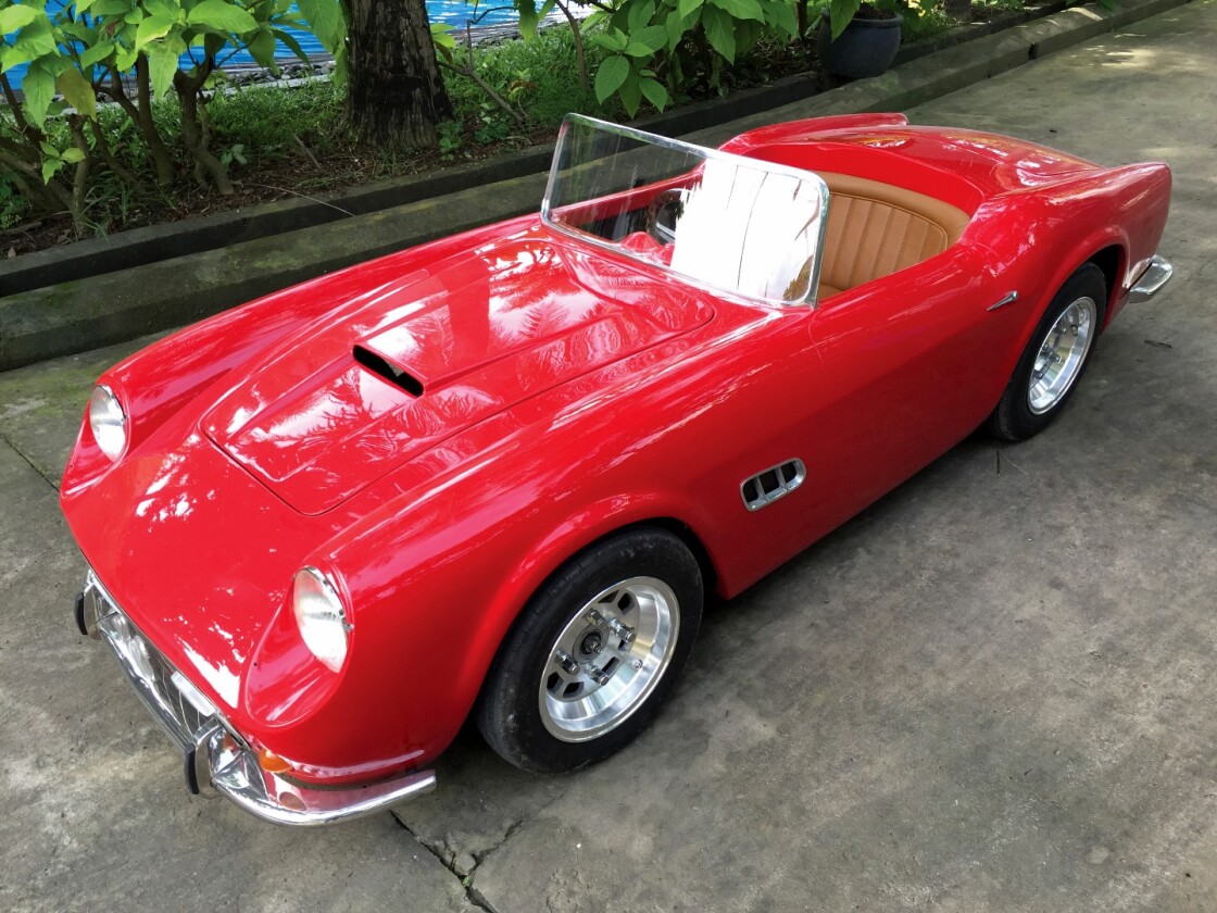 This Ferrari 250 GT California Spider replica children's car appears to have been built on the same mechanical basis as the Jaguar XK 120, Aston Martin DB5 and Shelby 289 Cobra cars in this list and we suspect they were originally built by Harrington Group. It sold for $36,000 at RM-Sotheby's Scottsdale 2018 auction.